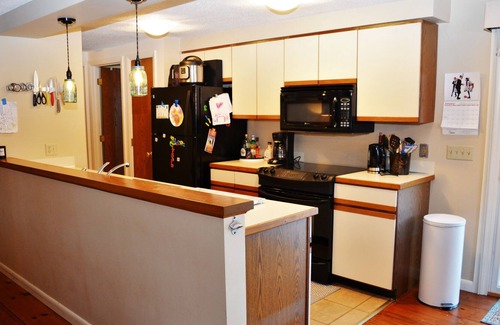 Grantham Condo | Enjoy beautiful water views and water access to West Cove from this light-filled condo