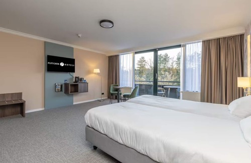Exloo Hotel | Enjoy Scenic Cycling Trails & Tennis, Plus Indoor Pool Access and Free Parking