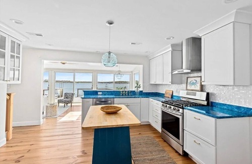 Scituate House | Enjoy serene oceanfront home with harbor views.