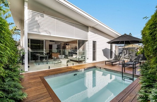 Lennox Head Apartment | Enjoy the deluxe swimming pool surrounded by a poolside sundeck
