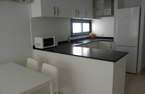 Son Xoriguer Apartment | BEAUTIFUL NEWLY RENOVATED Apartment next to the beach and the seaport of Calan B
