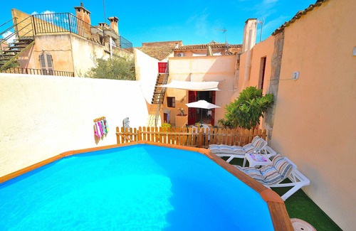 Petra Ski Chalet | Es Forn 229 cosy village house with private pool, terrace and WiFi