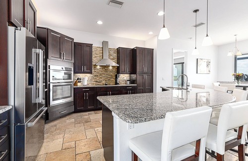 Diplomat House | Escape to Serenity: 5 Suites, a Private Resort Pool, & Endless Florida Sunshine