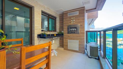 Praia Grande House | Espaçoso Apto 2 Quartos com PISCINA, VISTA MAR e Churrasqueira- PERFEITO PARA FAMÍLIA na PRAIA DOS ANJOS RESIDENCE CLUB