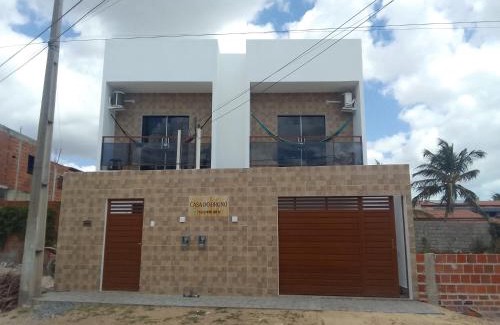 Prea Apartment | Estrela Apartamento 2 terreo - Quarto e sala com cozinha americana na praia do prea-Ce