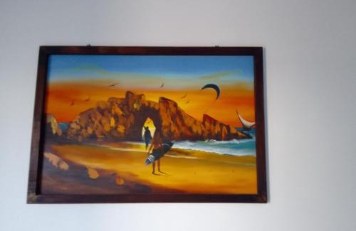 Prea Apartment | Estrela Apartamento 2 terreo - Quarto e sala com cozinha americana na praia do prea-Ce