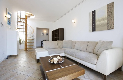 Ghiffa Apartment | Exceptional 3 bedroom apartment with roof terrace in the former spa baths of Ghiffa