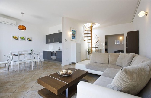 Ghiffa Apartment | Exceptional 3 bedroom apartment with roof terrace in the former spa baths of Ghiffa