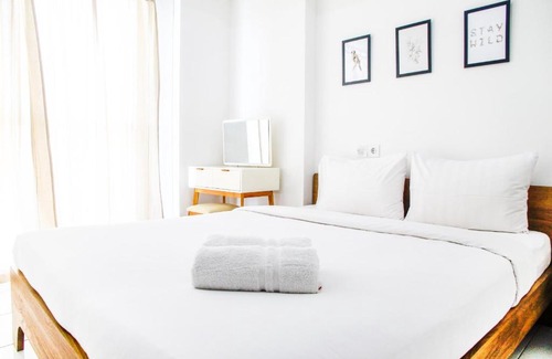 Pagedangan Apartment | Exclusive 1BR Casa De Parco Apartment By Travelio