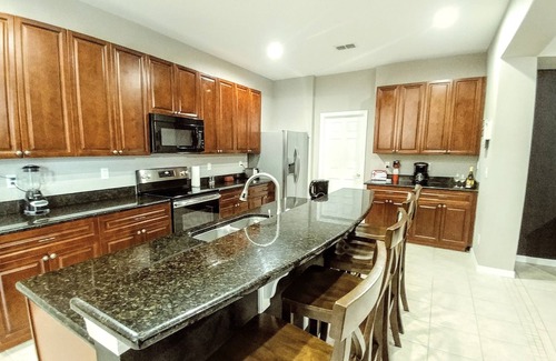 Legacy Park House | Executive Villa 7BR & 4.5 bath with Pool/SPA/Game Room near DisneyWorld Orlando.