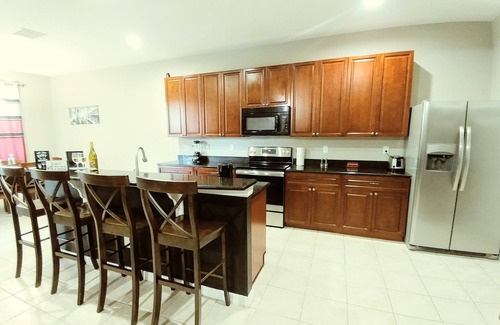 Legacy Park House | Executive Villa 7BR & 4.5 bath with Pool/SPA/Game Room near DisneyWorld Orlando.