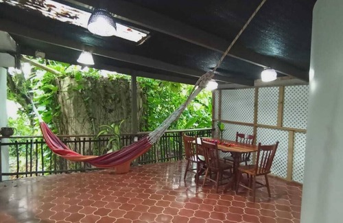 San Ignacio Apartment | Experience comfort and relaxation in our air-conditioned apartment, featuring two spacious bedrooms, a welcoming living room, a fully equipped private kitchen, and a well-appointed private bathroom. Perfect for families or groups.
