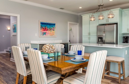 Dauphin Island House | Experience luxury at Blue Pearl, a stunning 5-bedroom beachfront home in Dauphin Island