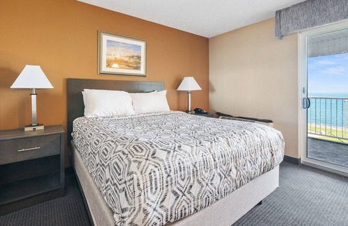 Put-in-Bay House | Experience Luxury and Comfort in Our Spacious Suite with Room Divider 318