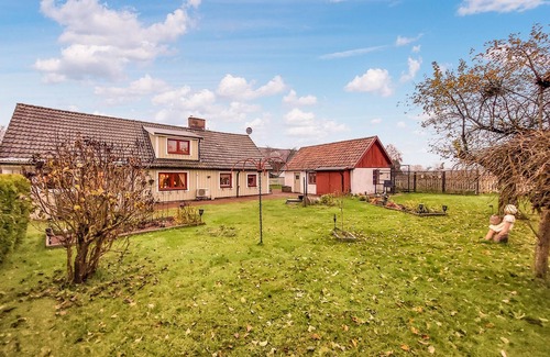 Broby House | Experience the beautiful Helgeå River during a vacation in this vacation home.