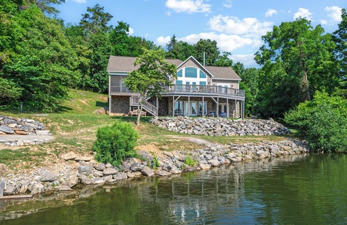 Pulaski House | Experience the perfect blend of rustic charm and modern luxury in this Claytor lakefront retreat