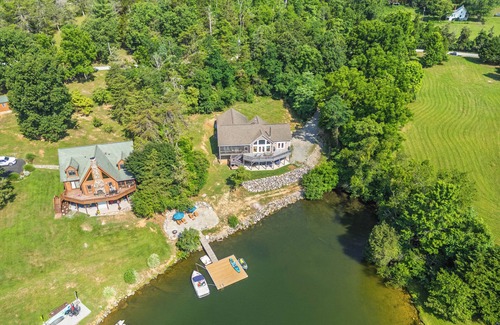 Pulaski House | Experience the perfect blend of rustic charm and modern luxury in this Claytor lakefront retreat