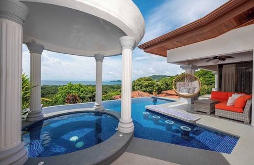 Playa Hermosa House | Experience the pinnacle of luxury at Casa del Mar, a stunning 4-bedroom home located in the prestigious Hermosa Heights.