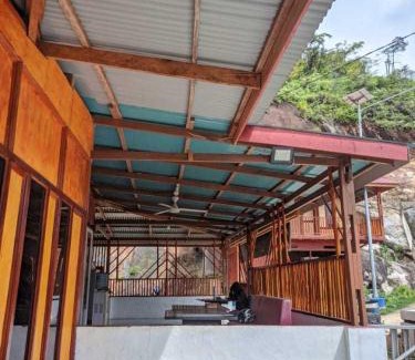 Painan Hotel | EXPRESS O 91702 Mandeh Homestay Syariah Near Bank Nagari PT Bank Pembangunan Daerah (BPD) Sumbar Cabang Painan