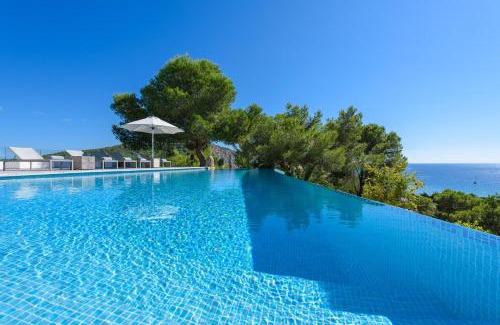 Sant Josep de sa Talaia Villa | Exquisite Ibiza Home I Jaw Dropping Sea Views I Casa Blanca Jondal I 4 Bedrooms I Gym I Outdoor Kitchen I San Jose