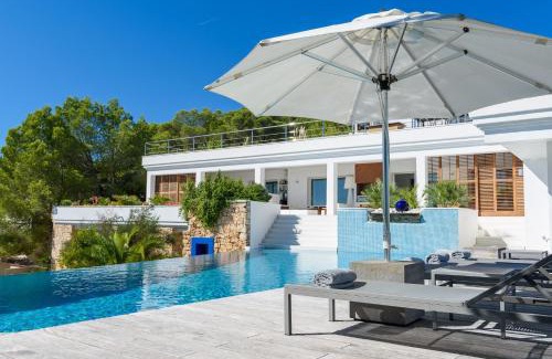 Sant Josep de sa Talaia Villa | Exquisite Ibiza Home I Jaw Dropping Sea Views I Casa Blanca Jondal I 4 Bedrooms I Gym I Outdoor Kitchen I San Jose