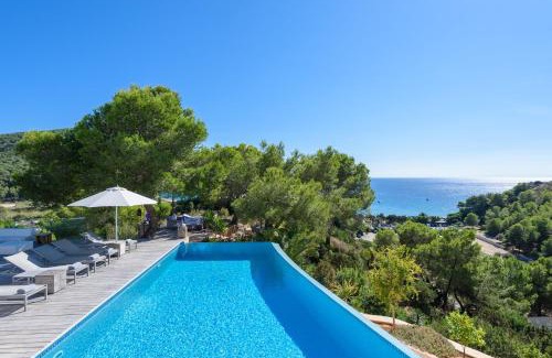Sant Josep de sa Talaia Villa | Exquisite Ibiza Home I Jaw Dropping Sea Views I Casa Blanca Jondal I 4 Bedrooms I Gym I Outdoor Kitchen I San Jose