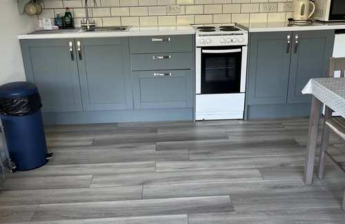 Mumbles Ski Chalet | Extended, upgraded, detached 2 bed chalet sleeps 4. Two minute walk to beach.