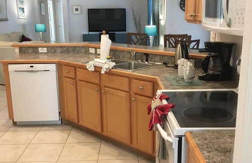Orange Tree Villa | Fabulous lake view 5 bed Villa south facing pool/spa 15 min from Disney & Wifi