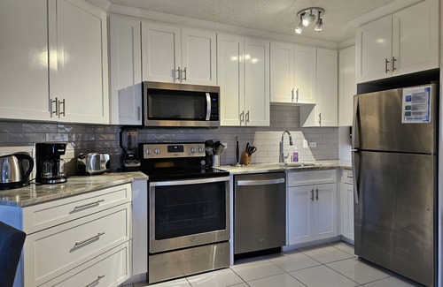 Seven Mile Beach Condo | FALL Specials! New kitchen! New bath King Bed NEW furniture Cayman Reef #5
