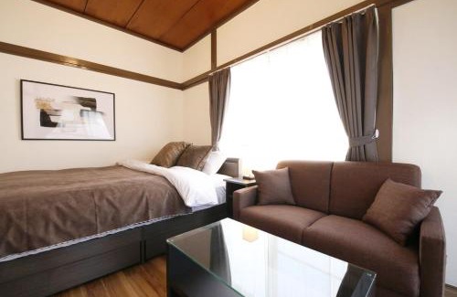 Kamiikebukuro Apartment | Family Base池袋 4DK プロジェクター2台導入 子どもが喜ぶ大型2段ベッドあり 近隣に池袋のアニメショップ多数あり