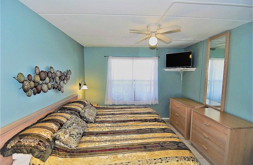 South Padre Island Condo | Family Beach Vacation! Across from Turtle Park! Pool and Splash Area for Little Ones.