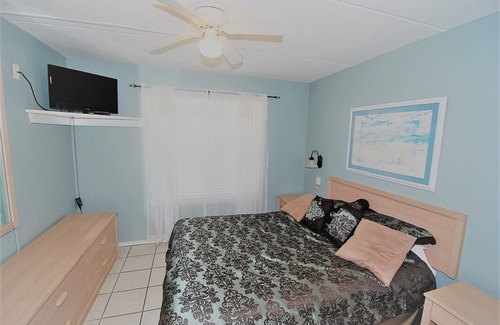 South Padre Island Condo | Family Beach Vacation! Across from Turtle Park! Pool and Splash Area for Little Ones.