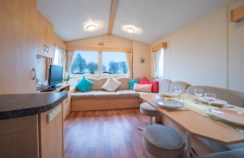 Balminnoch Ski Chalet | Family Caravan at Beautiful Three Lochs Park