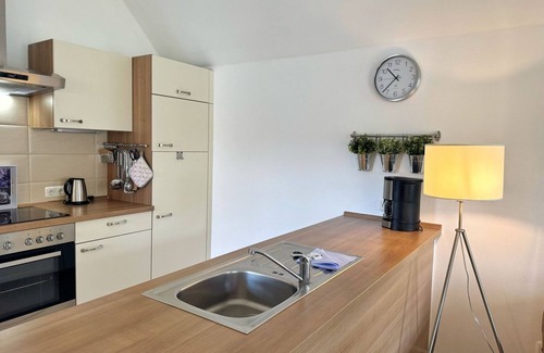 Glowe House | Family-friendly apartment with infrared sauna, fireplace & balcony near the beach -