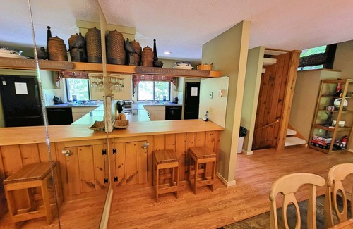 Lincoln House | Family friendly, deck, woods view, AC, pool access, near Loon. C011E by LRS