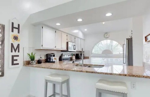 Golden Gate House | Family friendly oasis w/ heated pool & canal views