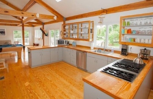 Croatan Beach House | Family-Friendly Sail Away Home with Billiard and Built-in Spa on the Deck by RedAwning