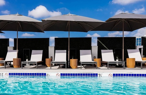 Norma Triangle Apartment | Family-Friends Reunion at the Rooftop Poolside Bar, Pet- Friendly Units
