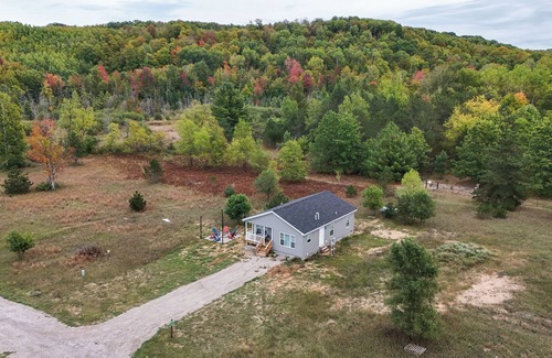 Rapid City Cottage | Family Home in Rapid City ~ 4 Mi to Torch Lake!
