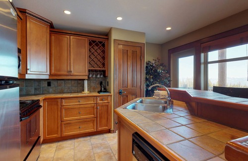 Big White Ski Resort Condo | Family Lodge with a Private Hot Tub & Mountain Views, Ski-In/Ski-Out Location