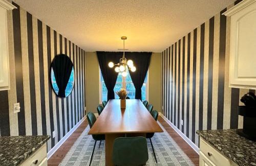 Greensboro House | Family Movie and Game Room 2 King 5 Queen and 2 Twin Beds