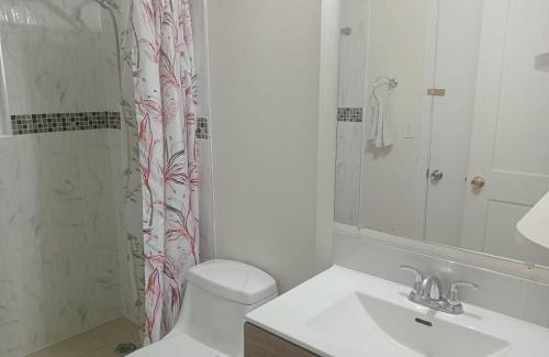 Surrey Newton House | Family Room with Attached Bathroom at King George Boulevard- Restaurants, Shopping, Transit at Walking Distance KG3