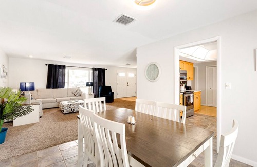 Merritt Island House | Family Vacation Home with pool, canal access for fishing or kayak with dolphins