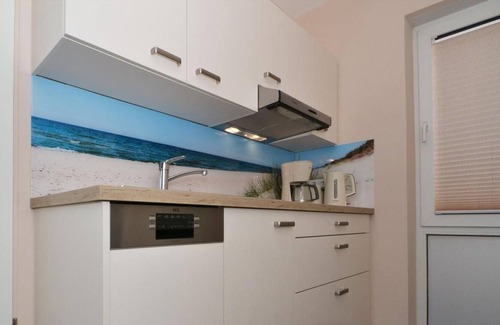 Koserow Apartment | Fantastic holiday apartment 50m from the pier in Koserow, with WLAN and terrace - holiday complex
