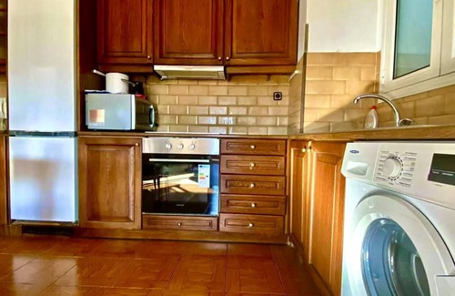 Kinosargous Apartment | Farglow Castle- a traditional hut with a view of the city from the sun terrace.