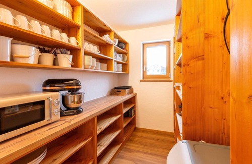 Bramberg am Wildkogel House | Farmhouse in Bramberg with Natural Pond