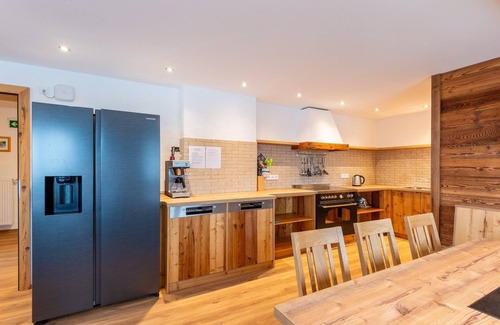 Bramberg am Wildkogel House | Farmhouse in Bramberg with Natural Pond