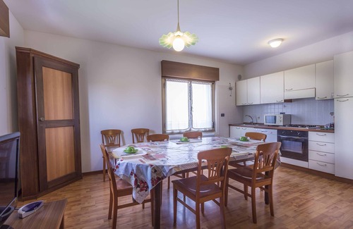 Palazzolo dello Stella Apartment | Fattoria 1, spacious apartment in the farm courtyard