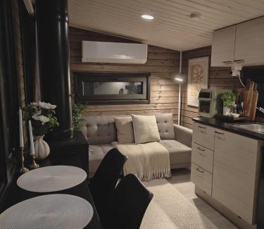 Lampivaara House | Fell Village 10 with a Mountain View, Fireplace, Sauna, Kitchen
