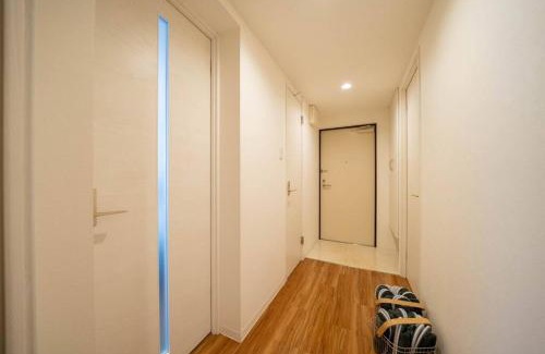 Nakajimakoen Apartment | Ferien 2LDK マスターベッドルーム・駐車場付